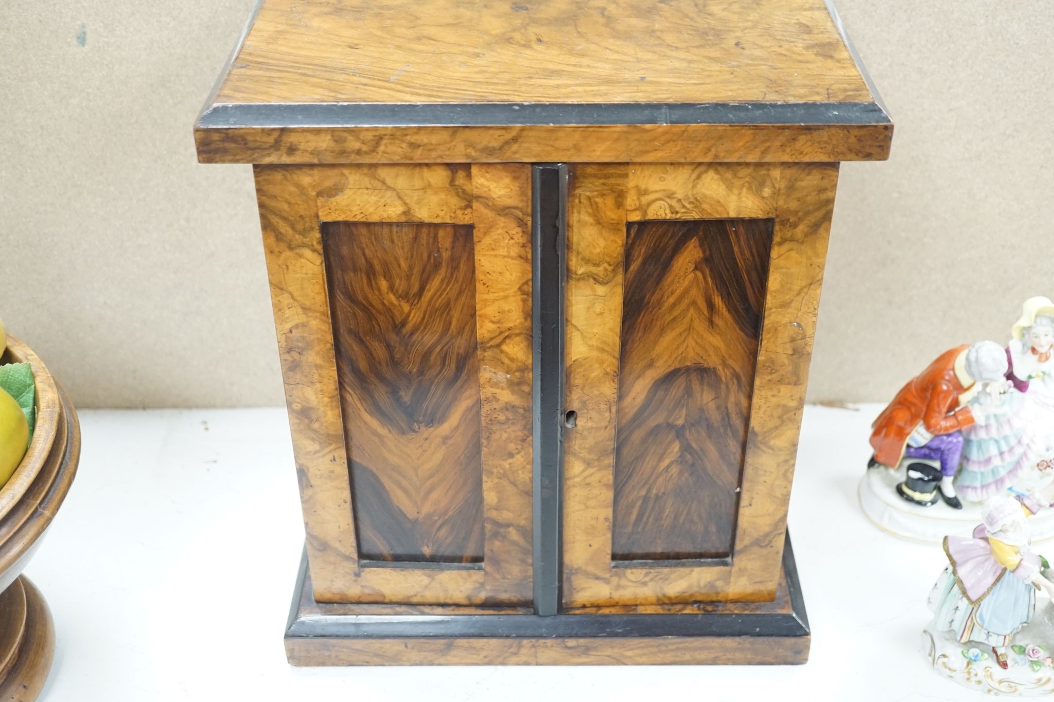 A Victorian walnut collector’s cabinet of drawers and adjustable book trough made out of ‘mahogany from the popular pleasure steamer “La Marguerite” dismantled 1926’
